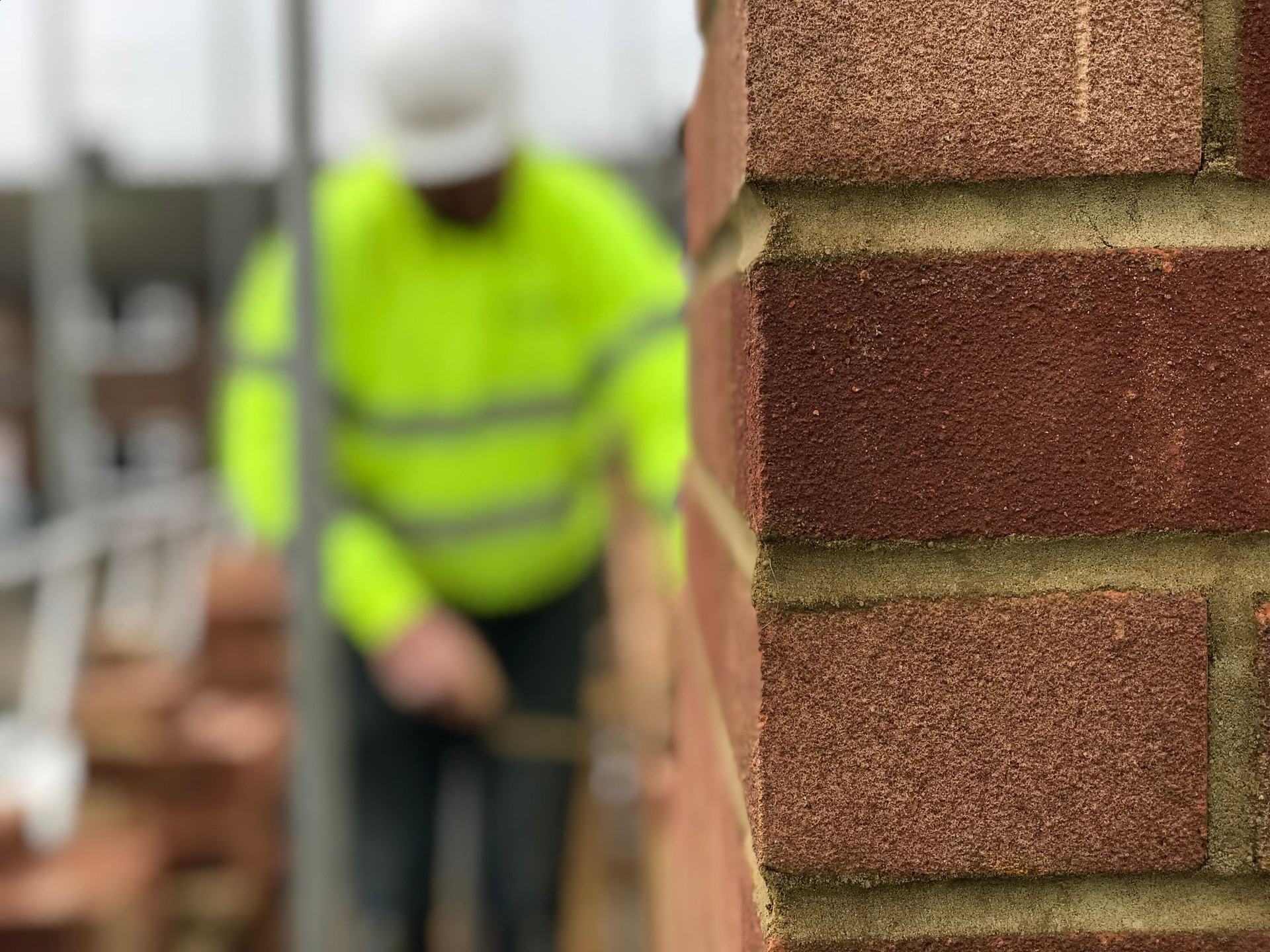 Builder at work Bricklaying on a home extension or new build house
